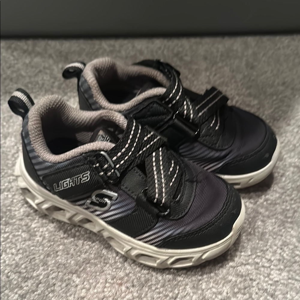 Skechers Black and White Sneakers with Light up Sole and Comfortable Padding